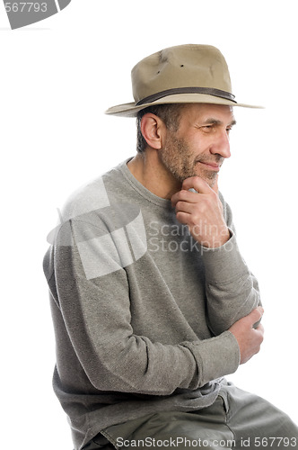 Image of middle age man adventure hat thinking