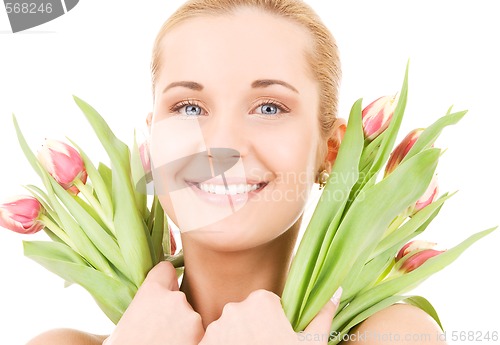 Image of happy woman with flowers