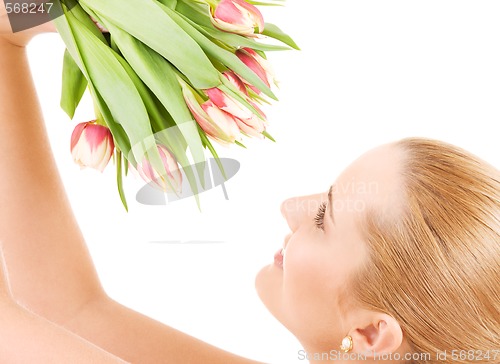 Image of happy woman with flowers