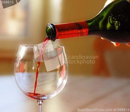 Image of Pouring red wine