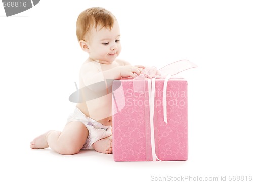 Image of baby boy with big gift box