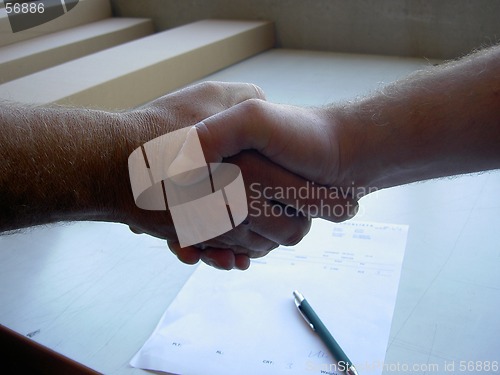 Image of contract on a piece of business