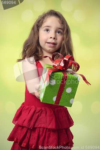 Image of Pretty girl giving present