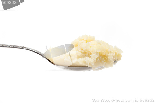 Image of Spoon with mashed potatoes left