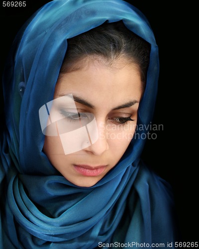 Image of Arab girl in blue scarf