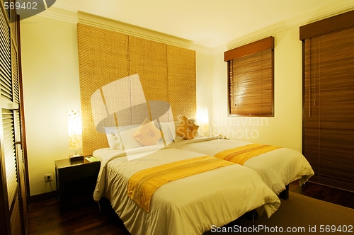 Image of Bed and table lamp