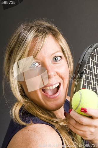 Image of woman tennis player happy