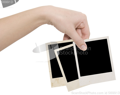 Image of photo frames in a hand