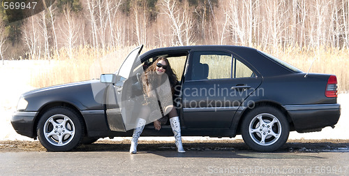 Image of woman in car