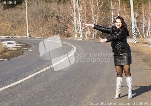 Image of woman on road