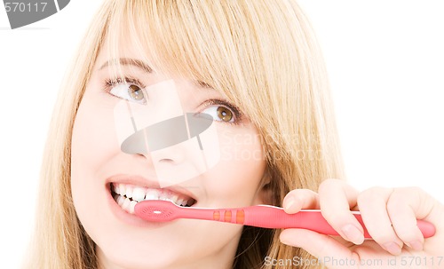 Image of happy girl with toothbrush