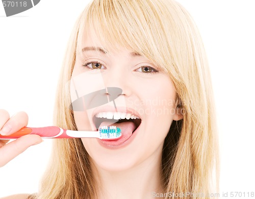 Image of happy girl with toothbrush