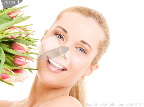 Image of happy woman with flowers