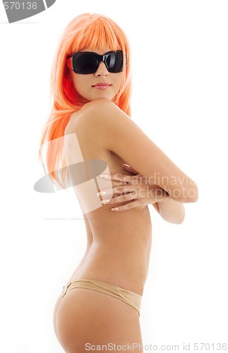 Image of girl in shades with orange hair