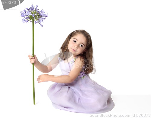 Image of Serene girl with flower