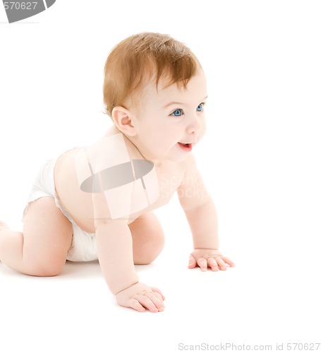 Image of crawling baby boy in diaper