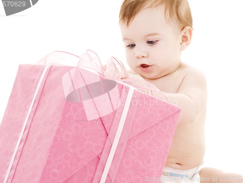 Image of baby boy with big gift box