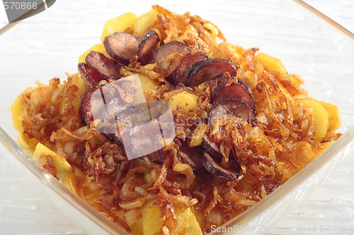 Image of Roasted potatoes with onion and sausage