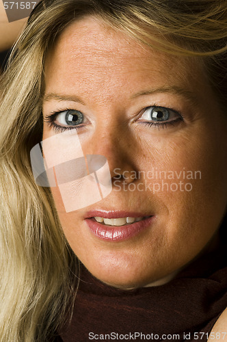 Image of  head shot attractive pretty middle age woman blond female