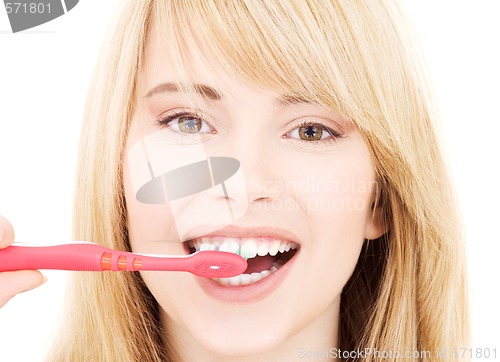 Image of happy girl with toothbrush