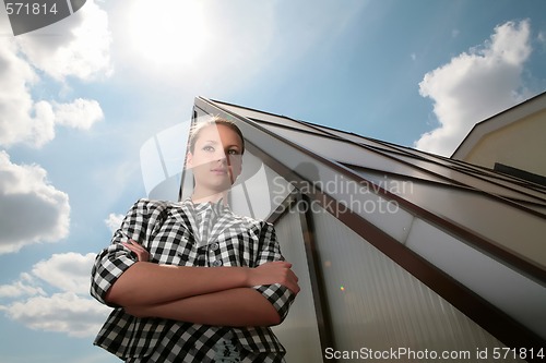 Image of girl near glass pyramid