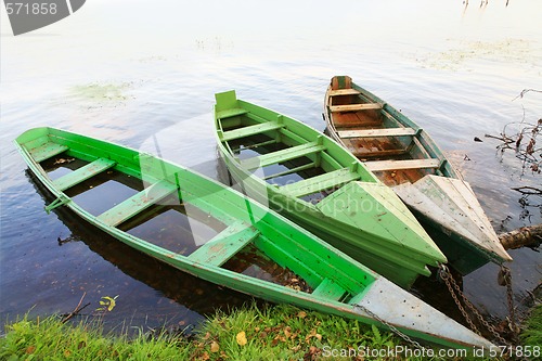 Image of three wooden boats