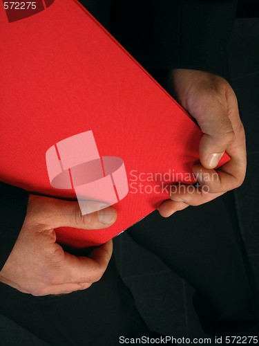 Image of Diploma and hands