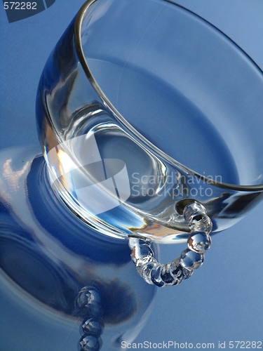 Image of Glass and water over blue background