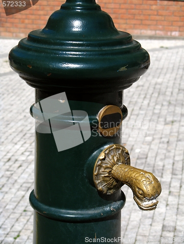 Image of Historic green water pump