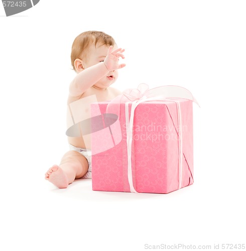 Image of baby boy with big gift box