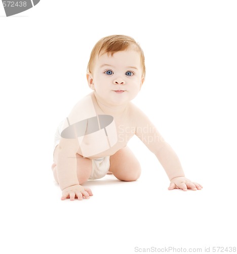 Image of crawling baby boy in diaper