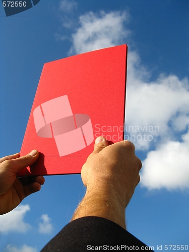 Image of Diploma and hand