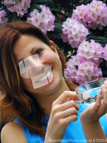 Image of Young girl drinking water