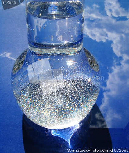 Image of Glass of water over blue background