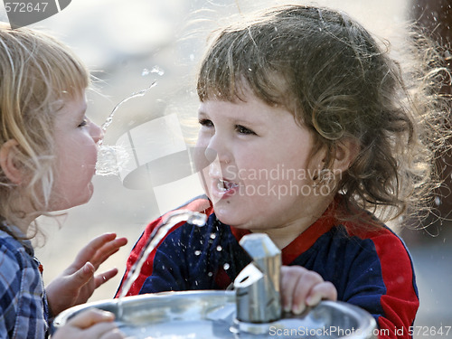 Image of Two boys by the drinking fountain