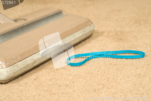 Image of Vacuuming The Carpet