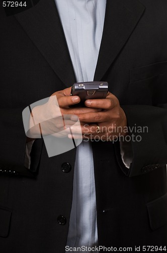 Image of Business man texting