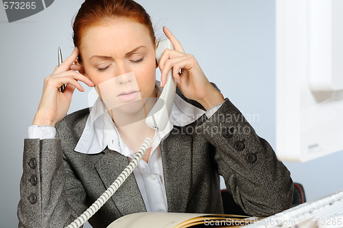 Image of Stressed businesswoman