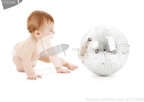 Image of adorable baby boy with big disco ball