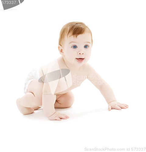 Image of crawling baby boy in diaper