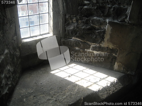 Image of Light through window in old Irish tower