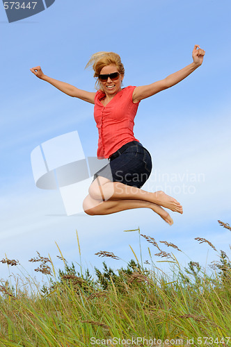 Image of Young lady jumping