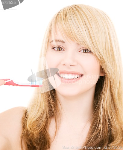 Image of happy girl with toothbrush