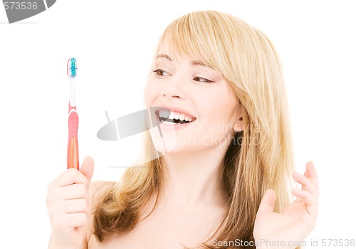 Image of happy girl with toothbrush