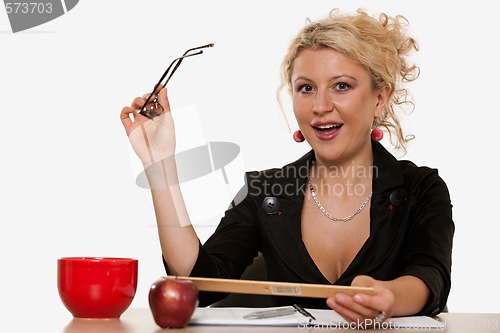 Image of Woman sitting at desk