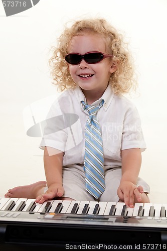 Image of Little piano player