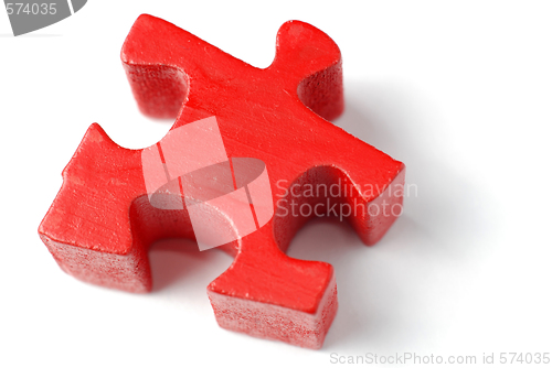 Image of Single red puzzle piece