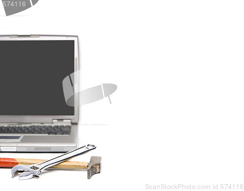 Image of laptop and tools