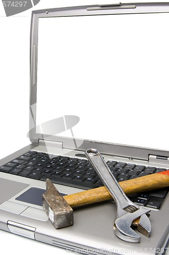 Image of laptop and tools