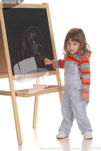 Image of beauty a little girl writing 